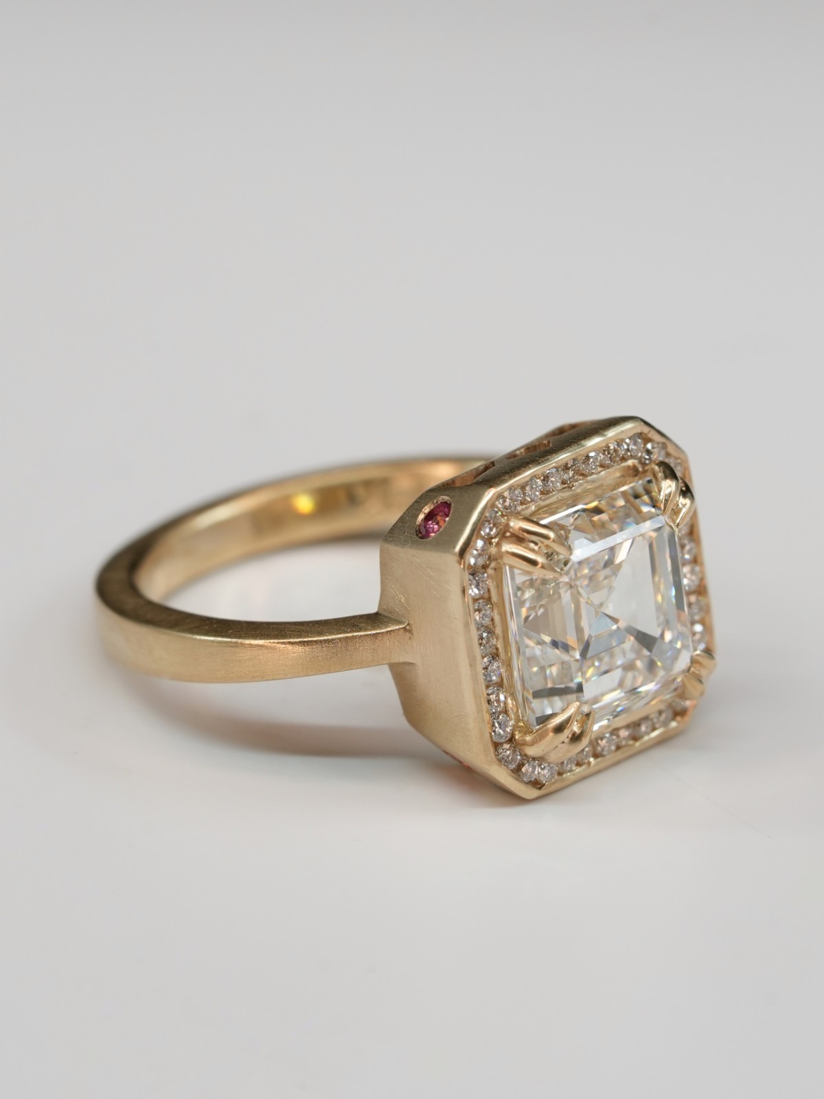 Asscher diamond and pink topaz engagement ring by Westlake Goldsmiths